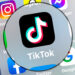 This photograph taken on March 23, 2022, shows logo of the networking application TikToK displayed on a tablet in Lille, northern France. (Photo by DENIS CHARLET / AFP)